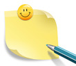 Zettel mit Smiley und Stift
