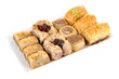 Sweet baklava on plate isolated on white