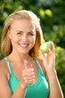 beautiful happy smiling woman with green apple