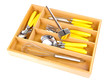 Wooden cutlery box with checked cutlery isolated on white