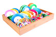 Bright silk ribbons in wooden box, isolated on white