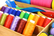 Sewing accessories in wooden box close up