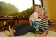 Photo: Grandma & Kid Playing at Home 2 Grandma & Kid Playing at Home 2
