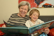 Photo: Grandma Reads Book with Grandchild 1 Grandma Reads Book with Grandchild 1