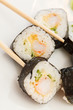 sushi with chopsticks