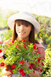 Photo: Young woman gardening Young woman gardening