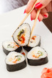 sushi with chopsticks