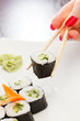 sushi with chopsticks