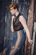 fashion model posing outdoor in a rural setting