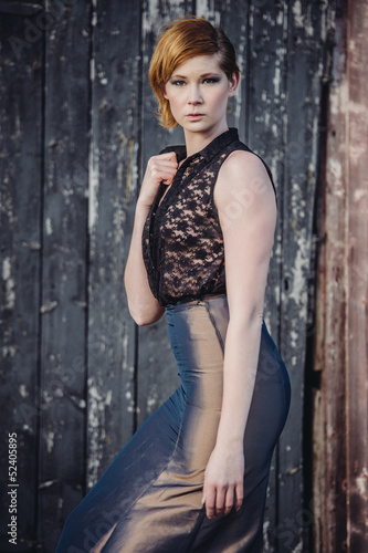 Photo: fashion model posing outdoor in a rural setting fashion model posing outdoor in a rural setting