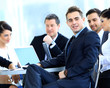 Portrait of mature business man smiling during meeting