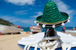 Photo: Green Spanish straw hat at beach Green Spanish straw hat at beach