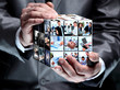Photo: man holding abstract cube with business images man holding abstract cube with business images