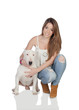 Attractive girl with a bullterrier dog