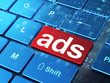 Advertising concept: Ads on computer keyboard background