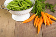 Fresh green peas and carrots