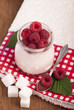 yogurt sundae with raspberries, sugar, cloth