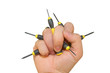 stock photo many small screwdriver was holding by one hand