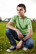 Young boy posing outdoors