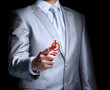 The businessman, a gesture, a finger.