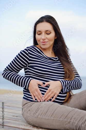 Photo: loving pregnant woman loving pregnant woman
