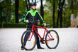 Urban biking - teenage boy and bike in city