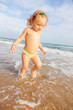 Photo: child walking beach child walking beach