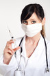 portrait of woman doctor with a syringe, isolated on white backg