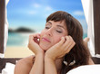 Photo: Young woman in front of the ocean Young woman in front of the ocean