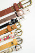  women leather belts isolated on white background