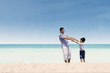Photo: Father and son at beach Father and son at beach