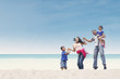 Photo: Happy family at beach Happy family at beach