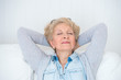 Foto: Smiling happy senior woman relaxing at home Smiling happy senior woman relaxing at home