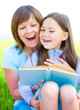 Mother is reading book with her daughter
