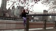 Girl's enjoying cherry blossoms at the Roosevelt Island.
