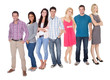 Photo: Casual group of people standing over white Casual group of people standing over white