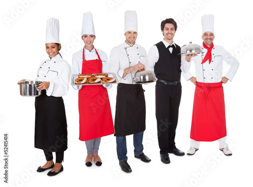 Photo: Group of chef and waiters Group of chef and waiters