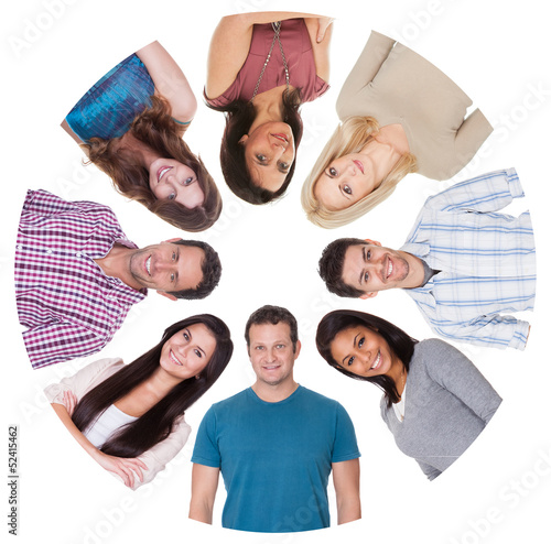Photo: Low angle view of diverse group of people Low angle view of diverse group of people