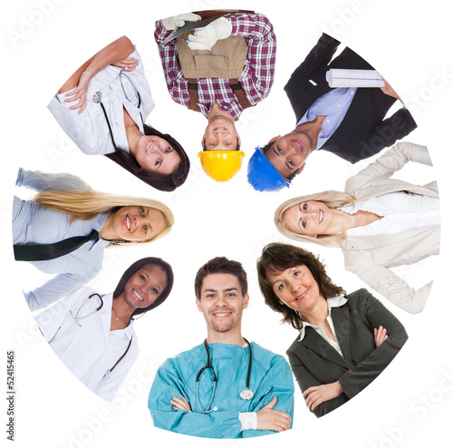 Photo: Low angle view of diverse professional group Low angle view of diverse professional group