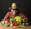 young farmer with vegetables