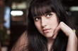 Young beautiful brunette woman. Close-up portrait.