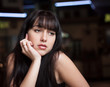 Young beautiful brunette woman. Close-up portrait.
