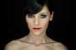 Portrait of a bautiful young woman with red lipstick