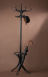 standing peg with umbrella and hat