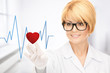 doctor pressing virtual button with heart diagram
