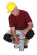 Photo: craftsman fixing a pipe craftsman fixing a pipe