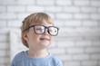 Photo: clever baby in glasses clever baby in glasses