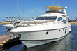 White motor yacht over harbor pier, Odessa, Ukraine