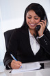 Young Woman Writing Message From Phone