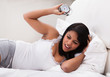 Overslept Woman Looking At Alarm Clock